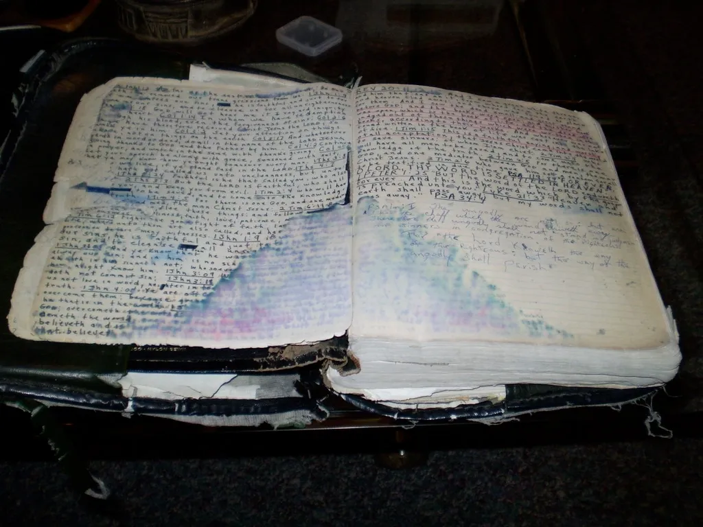 A book that has been torn open and broken.